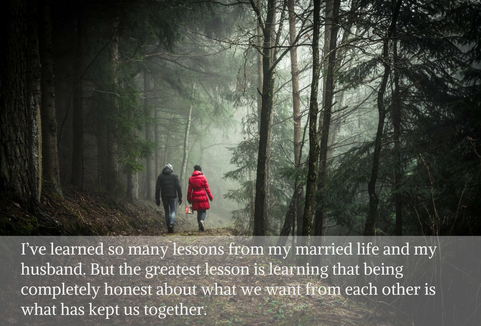 couple hiking in the woods with quote from article