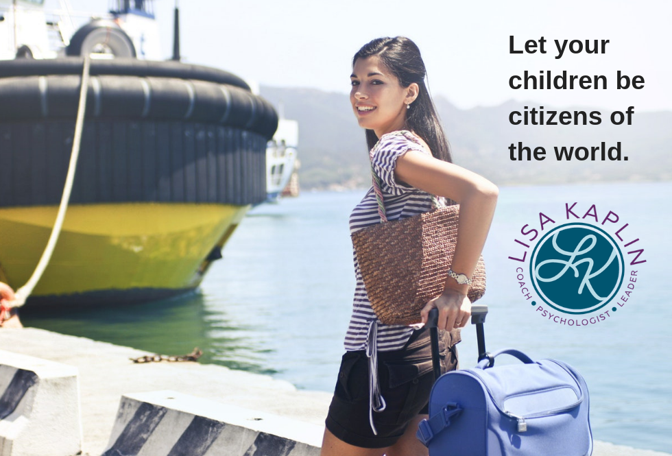 A color photo of young white woman with long dark hair pulling luggage and heading toward a ship. She is on the dock with the water behind her and looking back at the camera, smiling. At the top right of the image is the text “Let your children be citizens of the world.” The Lisa Kaplin logo is in beneath the text.