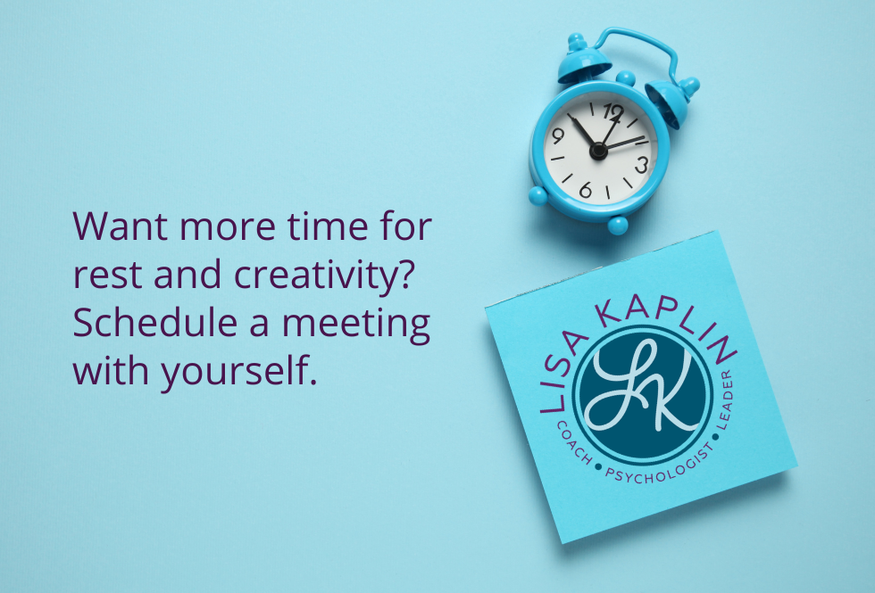 A color photo of an old-fashioned, blue metal alarm clock laying face-up above a blue post-it note pad. The background is a lighter shade of solid sky blue. The text to the left reads “Want more time for rest and creativity? Schedule a meeting with yourself.” The Lisa Kaplin logo is centered on the notepad.